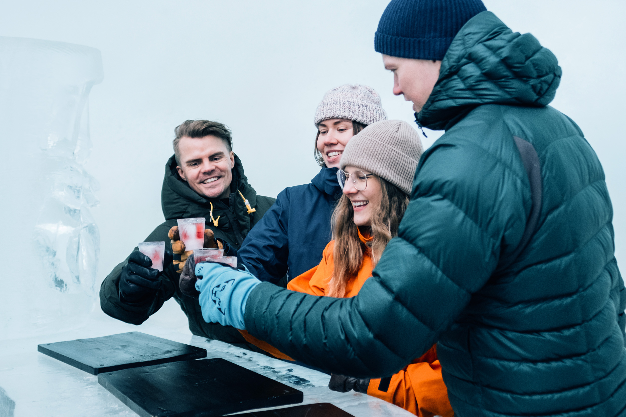 People in Ice Bar with icy drinks