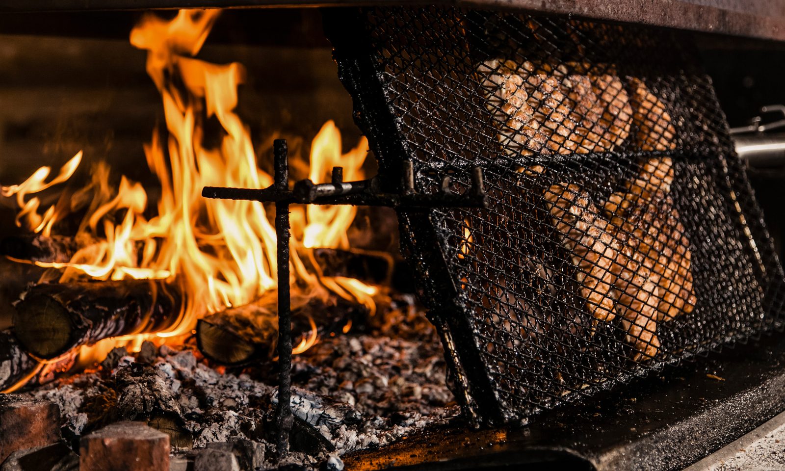 Salmon getting flamed by the fire in the Kota Restaurant