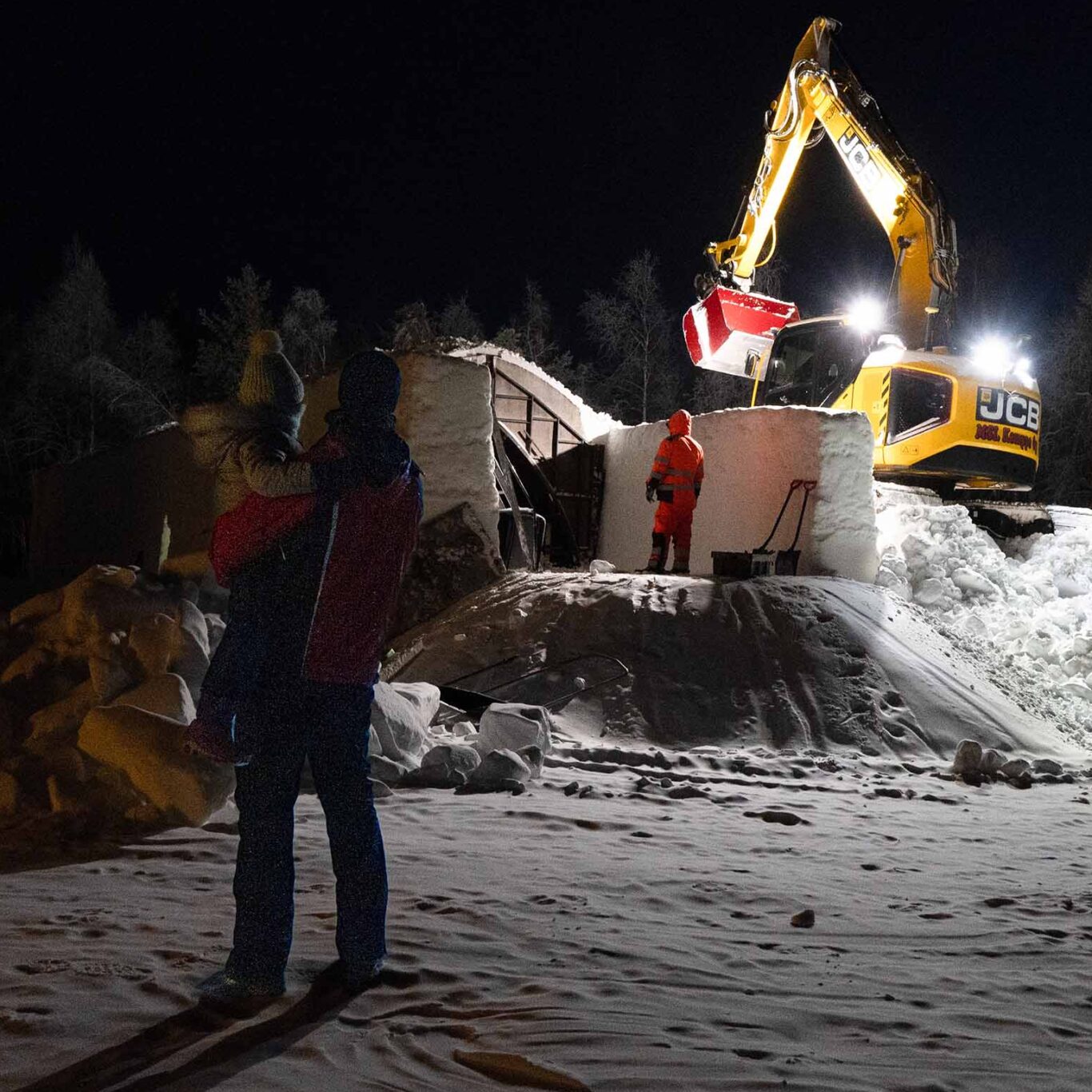 Guests watching snow building in early winter