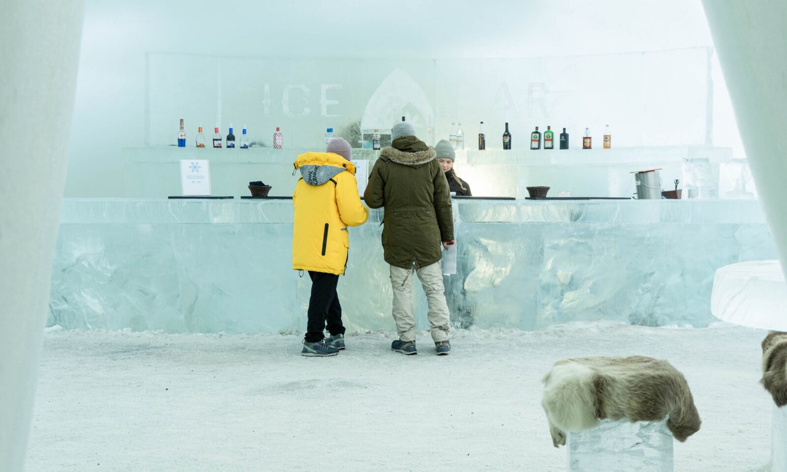 Two people in the Ice Bar.